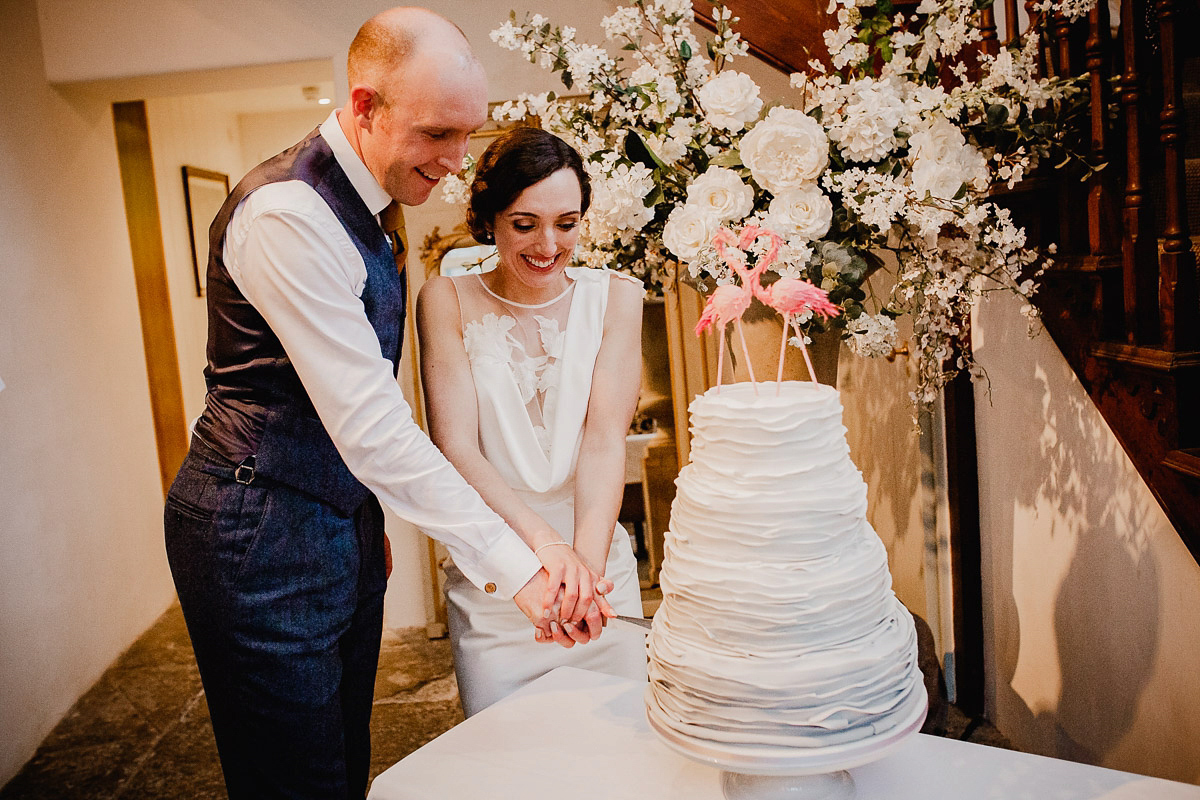 A David Fielden gown for a wedding at Pennard House in Somerset. Photography by Noel Deasington.