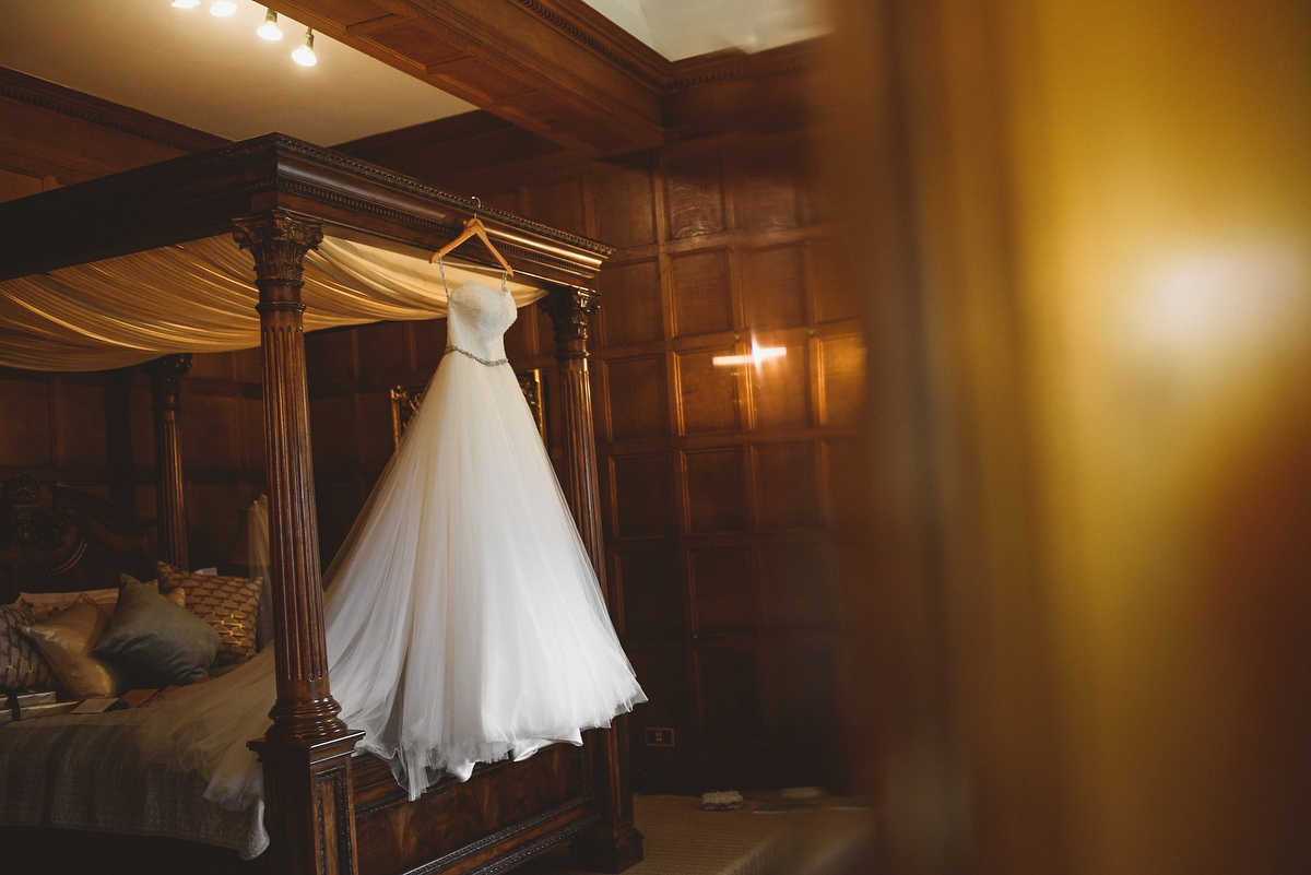 Sarah wore Rosa Clara for her classy and elegant black tie wedding at Hengrave Hall. Photography by Jackson & Co.