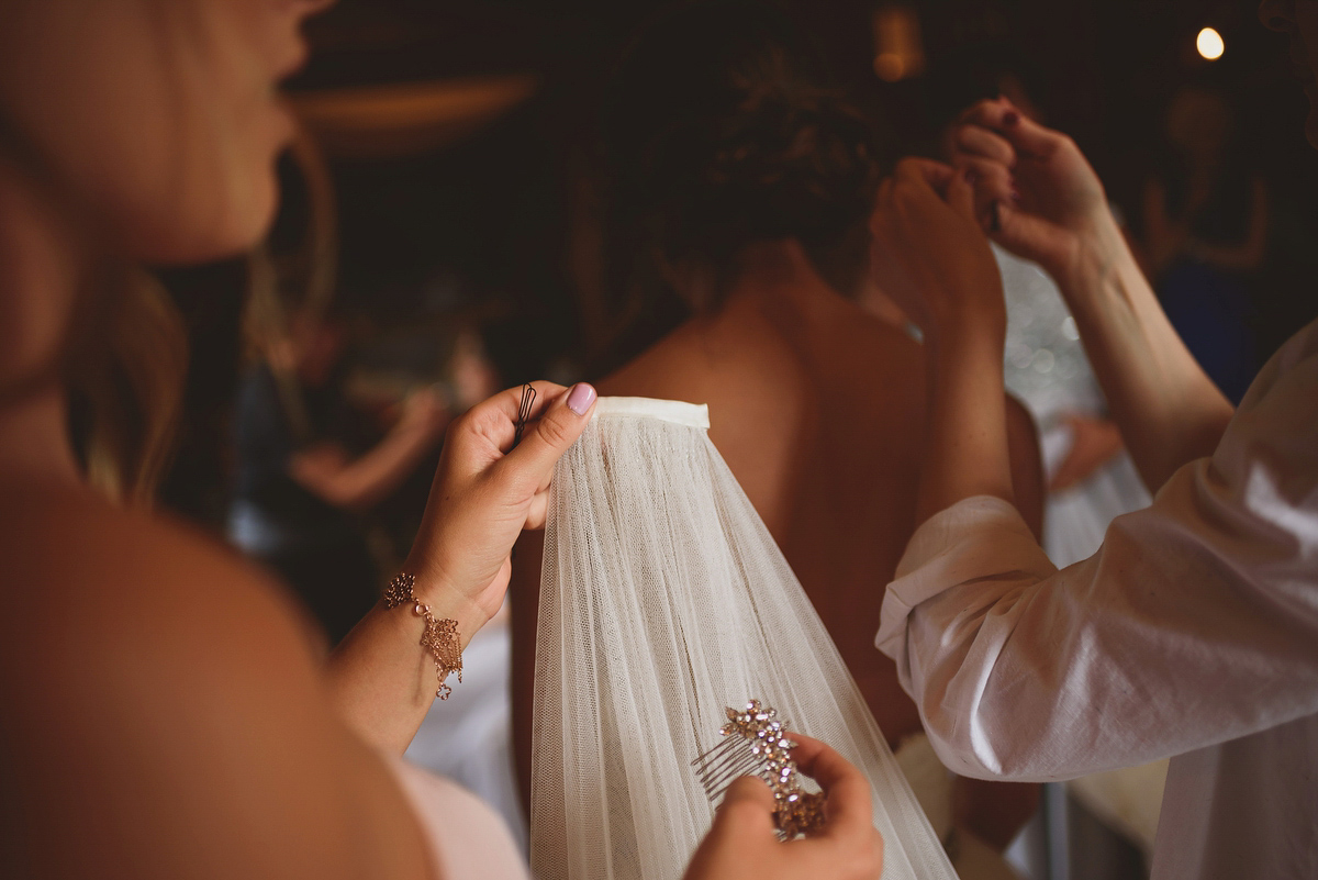 Sarah wore Rosa Clara for her classy and elegant black tie wedding at Hengrave Hall. Photography by Jackson & Co.