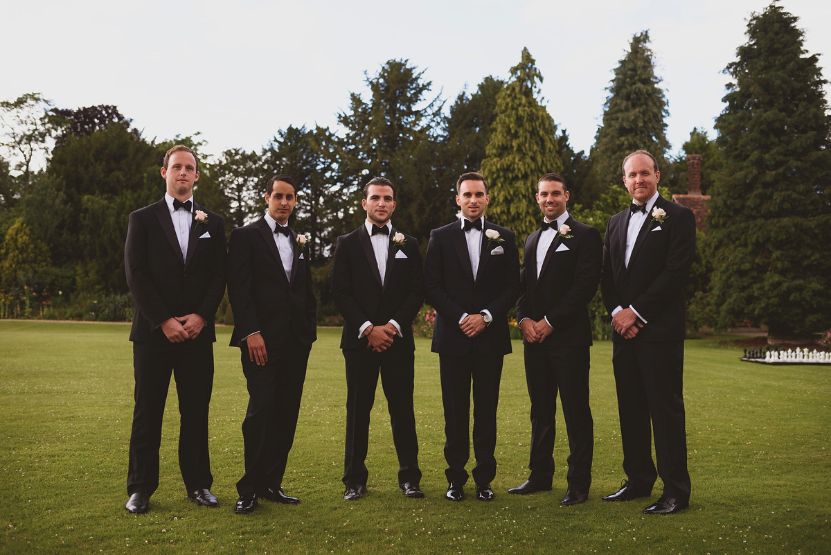 Sarah wore Rosa Clara for her classy and elegant black tie wedding at Hengrave Hall. Photography by Jackson & Co.