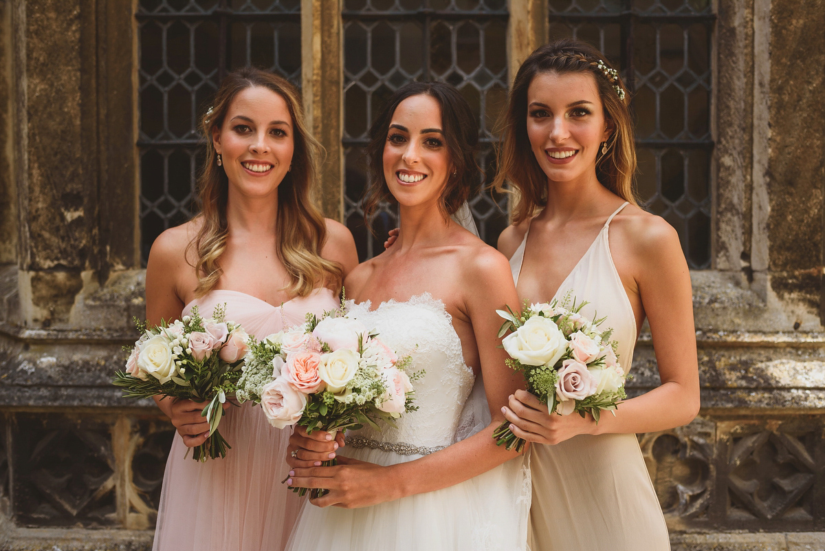 Sarah wore Rosa Clara for her classy and elegant black tie wedding at Hengrave Hall. Photography by Jackson & Co.