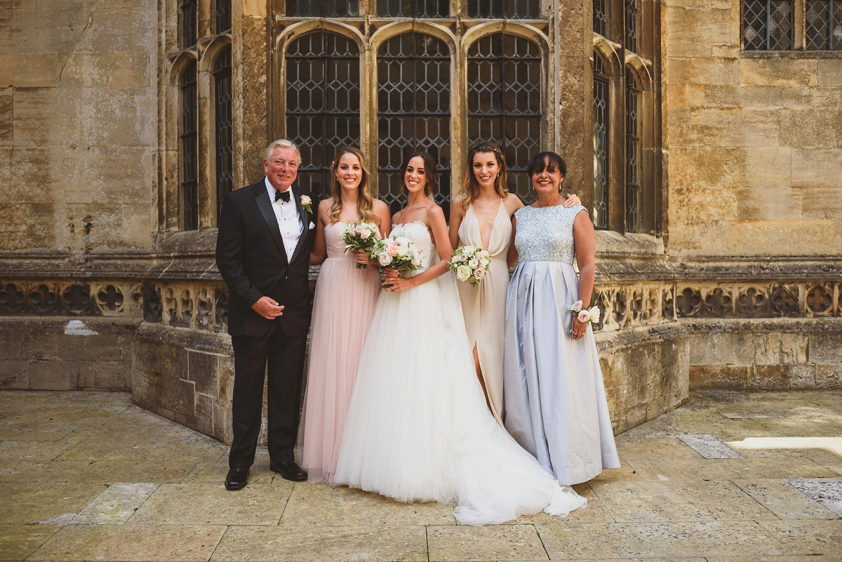 Sarah wore Rosa Clara for her classy and elegant black tie wedding at Hengrave Hall. Photography by Jackson & Co.