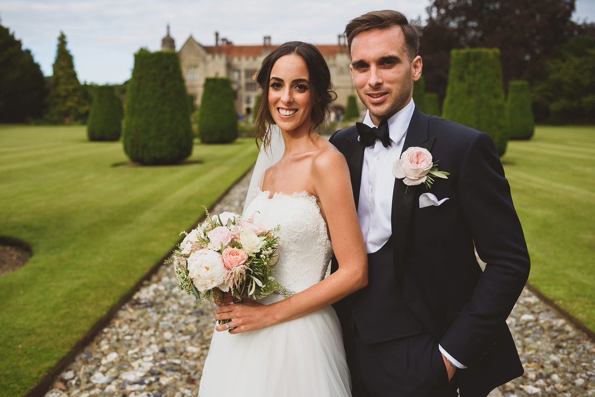 Sarah wore Rosa Clara for her classy and elegant black tie wedding at Hengrave Hall. Photography by Jackson & Co.