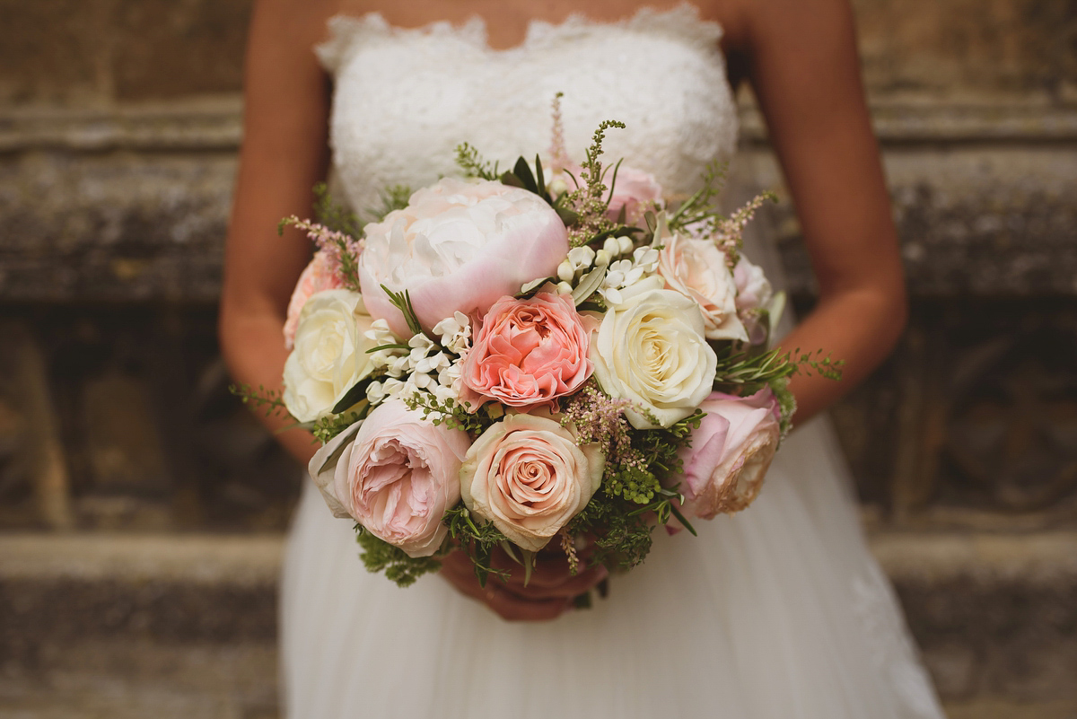 Sarah wore Rosa Clara for her classy and elegant black tie wedding at Hengrave Hall. Photography by Jackson & Co.