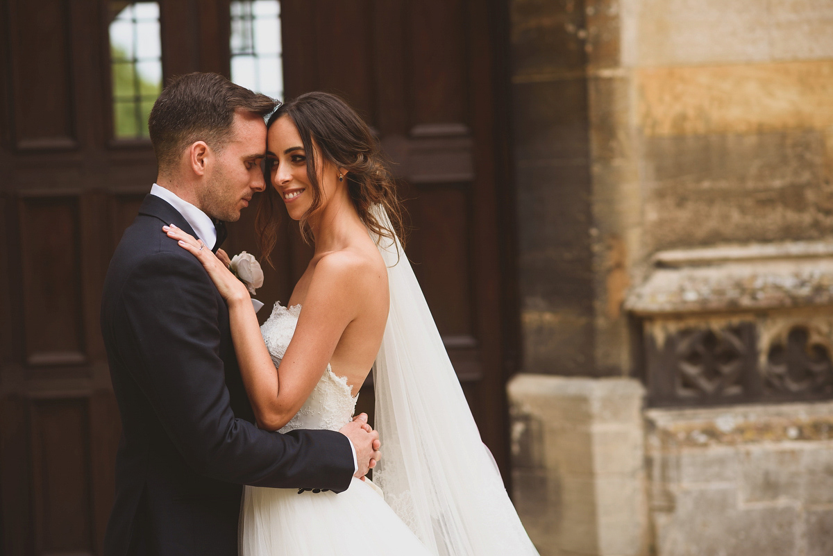 Sarah wore Rosa Clara for her classy and elegant black tie wedding at Hengrave Hall. Photography by Jackson & Co.