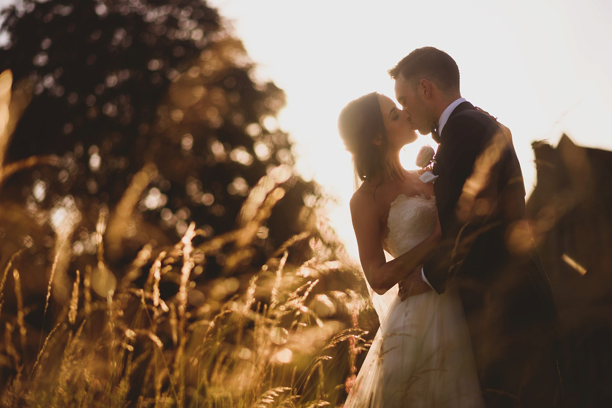 Sarah wore Rosa Clara for her classy and elegant black tie wedding at Hengrave Hall. Photography by Jackson & Co.