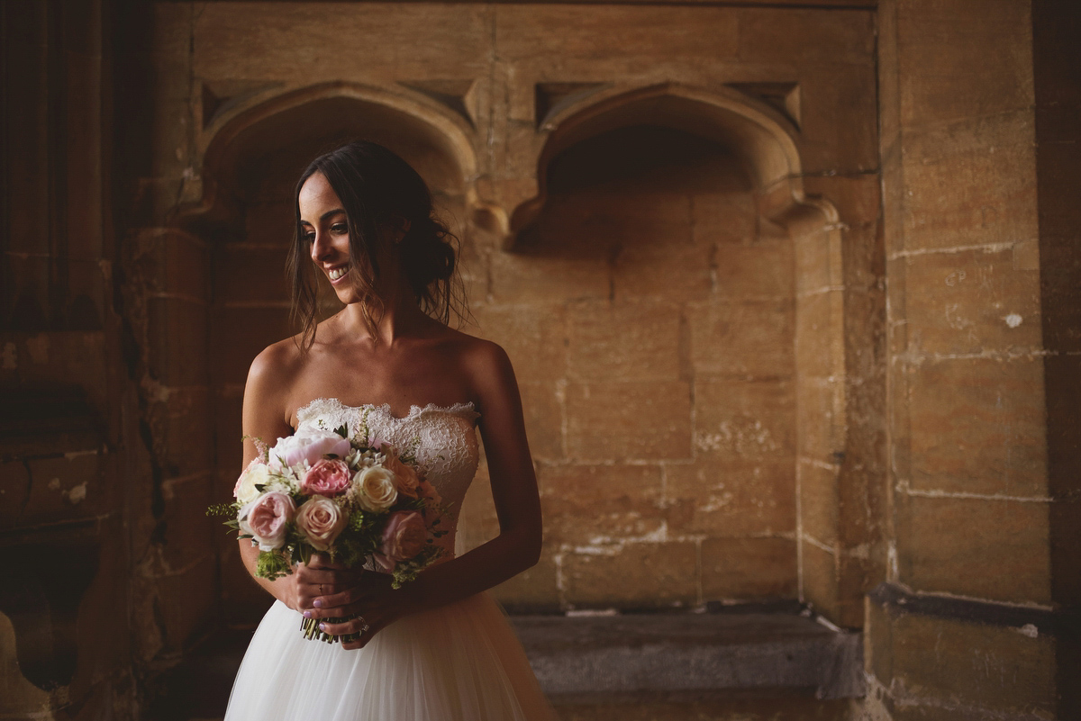 Sarah wore Rosa Clara for her classy and elegant black tie wedding at Hengrave Hall. Photography by Jackson & Co.