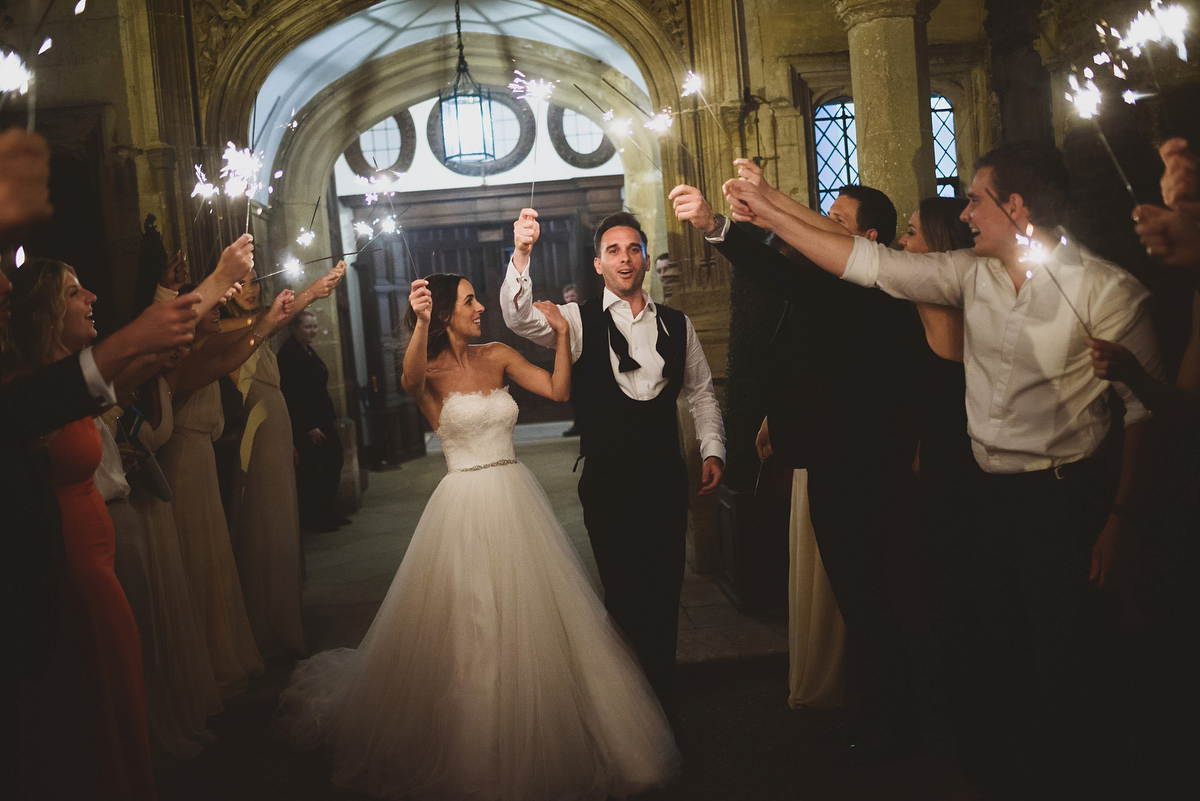 Sarah wore Rosa Clara for her classy and elegant black tie wedding at Hengrave Hall. Photography by Jackson & Co.