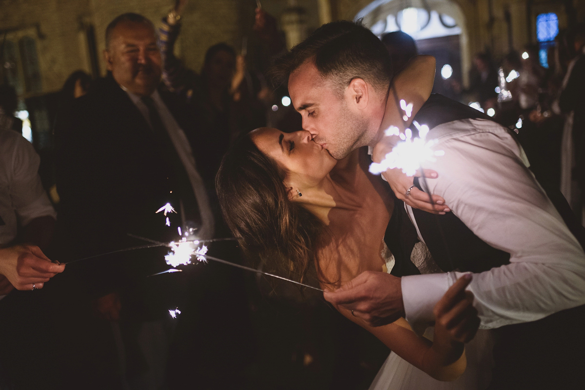 Sarah wore Rosa Clara for her classy and elegant black tie wedding at Hengrave Hall. Photography by Jackson & Co.