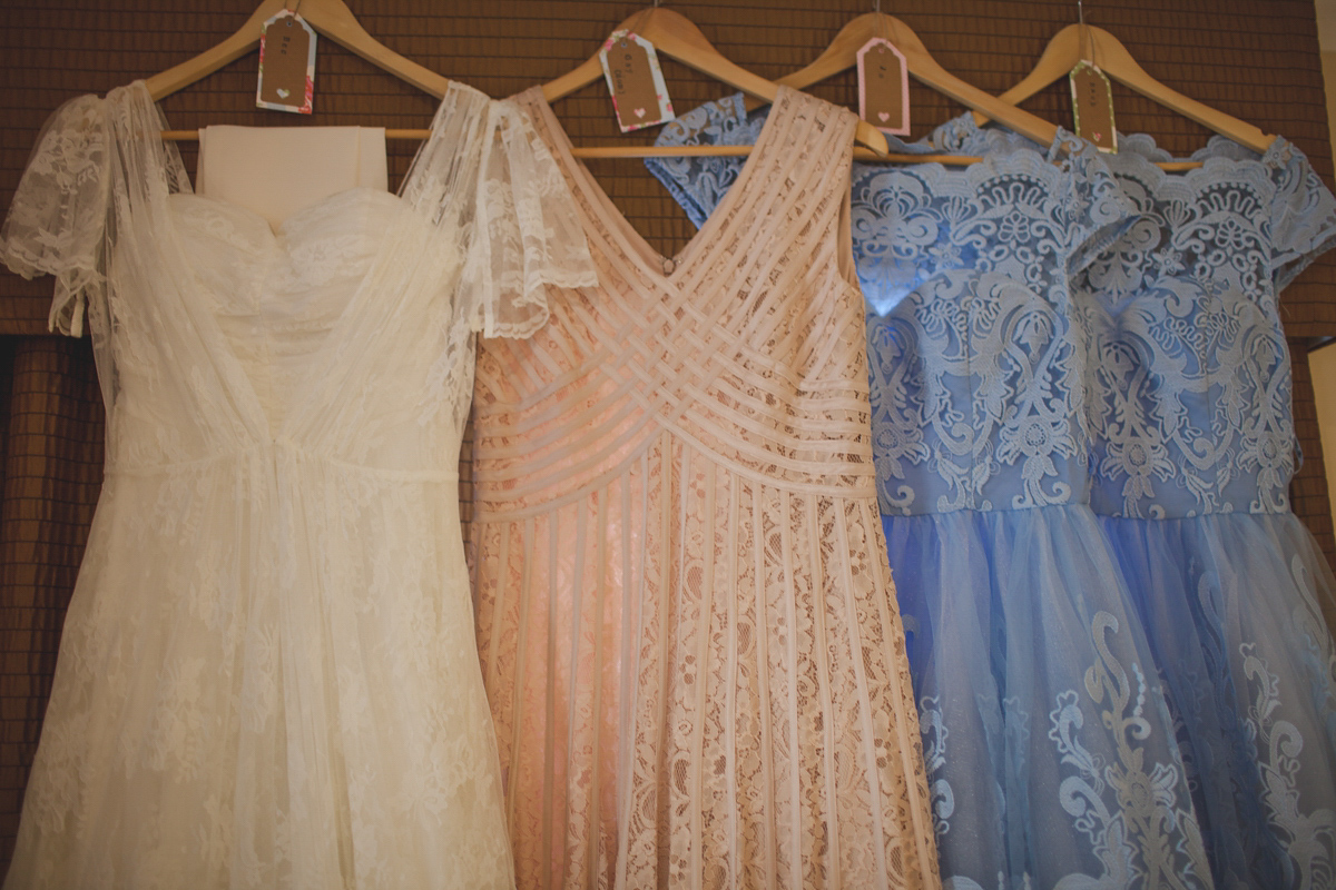 Rebecca wore a Charlie Brear gown from the Cicily Bridal boutique for her vintage tea party, village hall wedding. Captured by Ragdoll Photography.