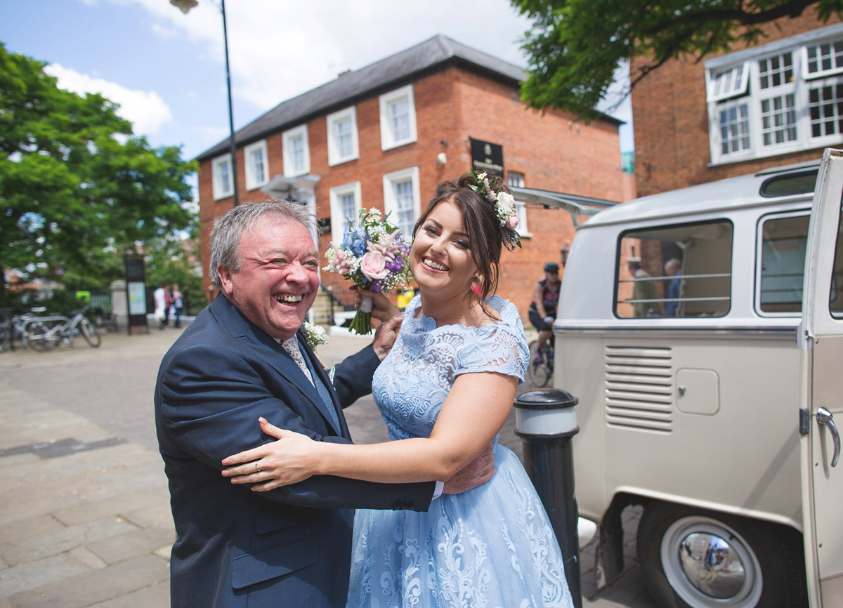 Rebecca wore a Charlie Brear gown from the Cicily Bridal boutique for her vintage tea party, village hall wedding. Captured by Ragdoll Photography.