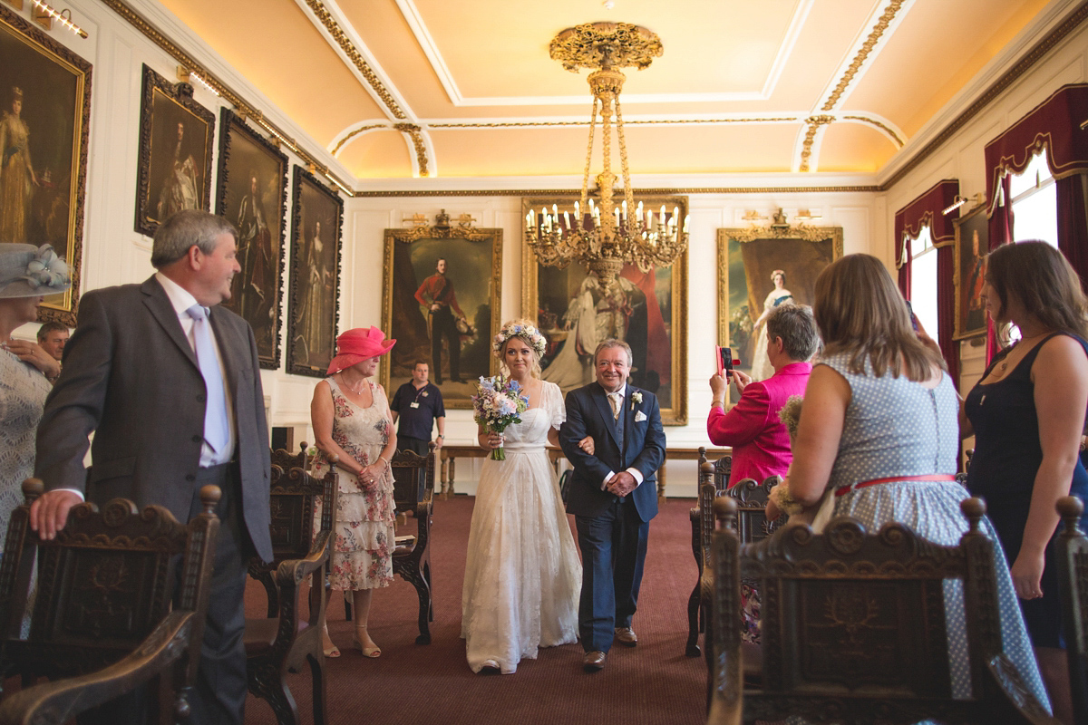 Rebecca wore a Charlie Brear gown from the Cicily Bridal boutique for her vintage tea party, village hall wedding. Captured by Ragdoll Photography.