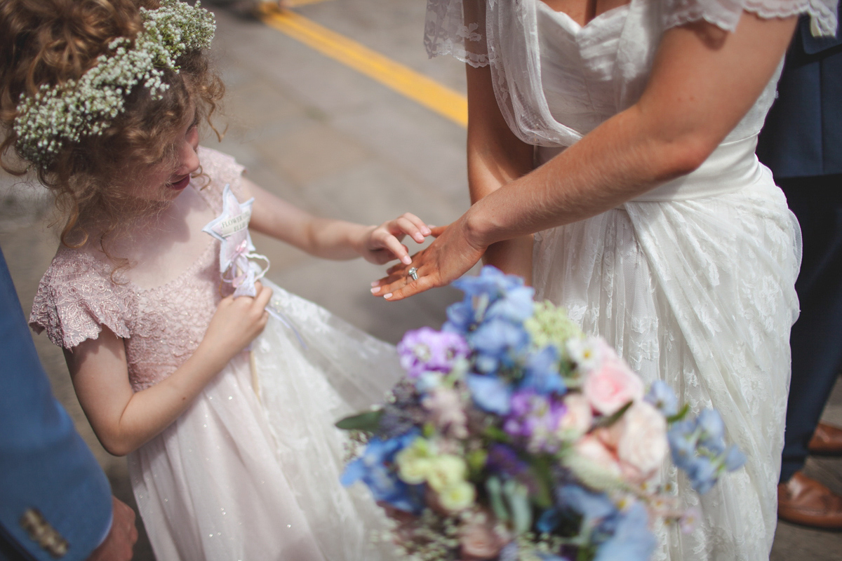 Rebecca wore a Charlie Brear gown from the Cicily Bridal boutique for her vintage tea party, village hall wedding. Captured by Ragdoll Photography.