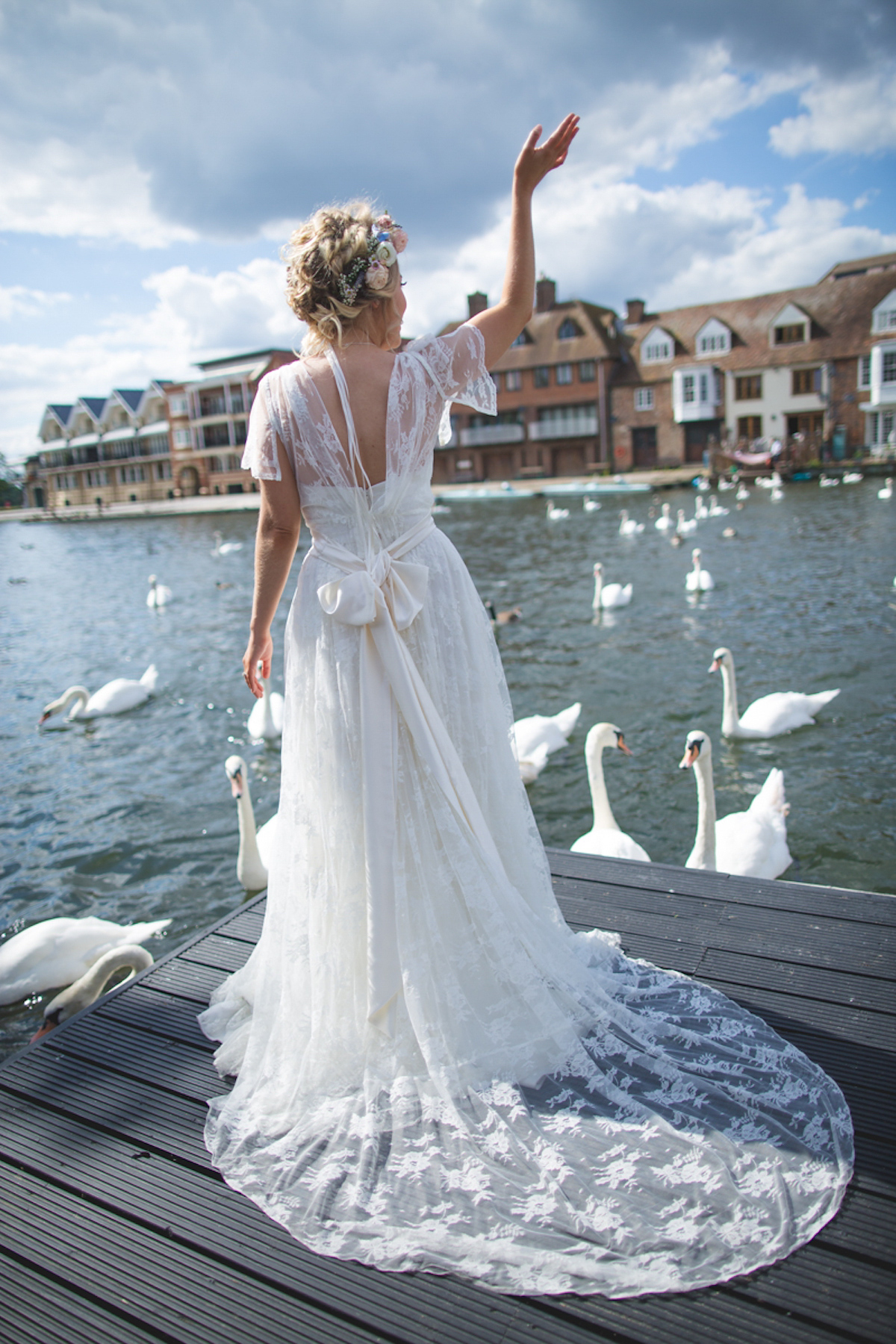 Rebecca wore a Charlie Brear gown from the Cicily Bridal boutique for her vintage tea party, village hall wedding. Captured by Ragdoll Photography.