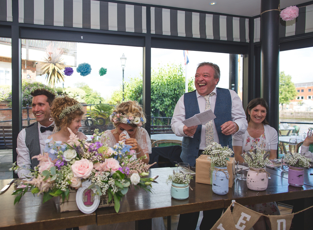 Rebecca wore a Charlie Brear gown from the Cicily Bridal boutique for her vintage tea party, village hall wedding. Captured by Ragdoll Photography.