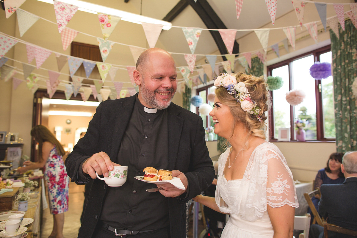 Rebecca wore a Charlie Brear gown from the Cicily Bridal boutique for her vintage tea party, village hall wedding. Captured by Ragdoll Photography.