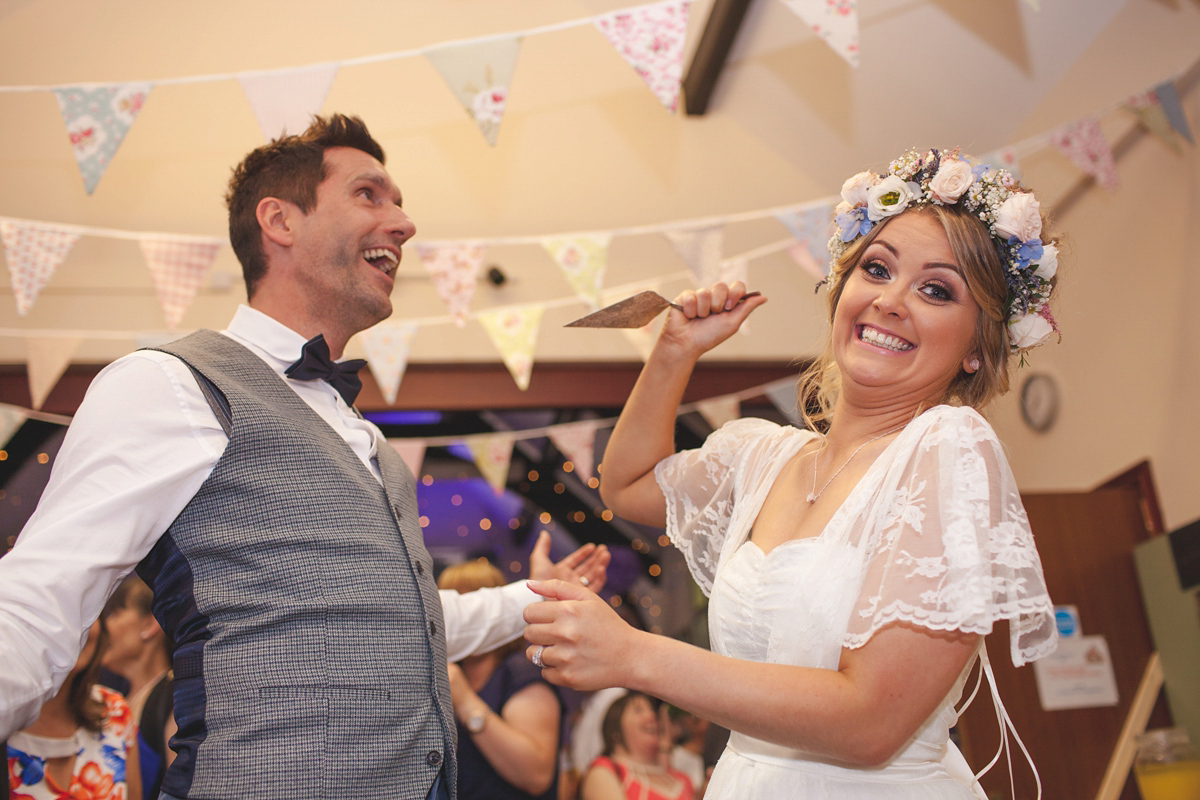 Rebecca wore a Charlie Brear gown from the Cicily Bridal boutique for her vintage tea party, village hall wedding. Captured by Ragdoll Photography.