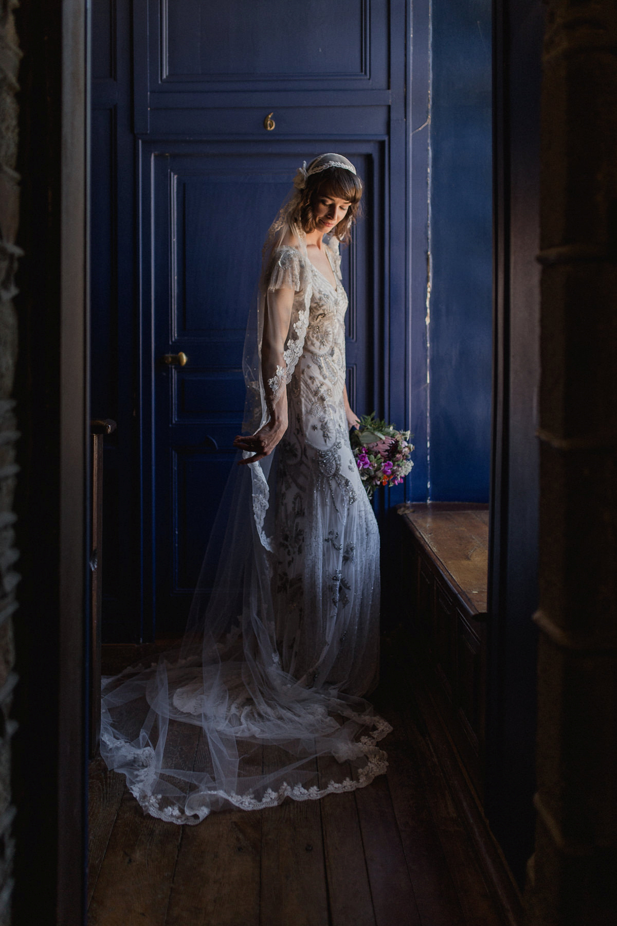 Bride Imogen wore the 'Jayne' gown by Eliza Jane Howell, and a Juliet cap veil, for her Celtic handfasting wedding at a French cheateau. Photography by Lifestories Wedding Photography.