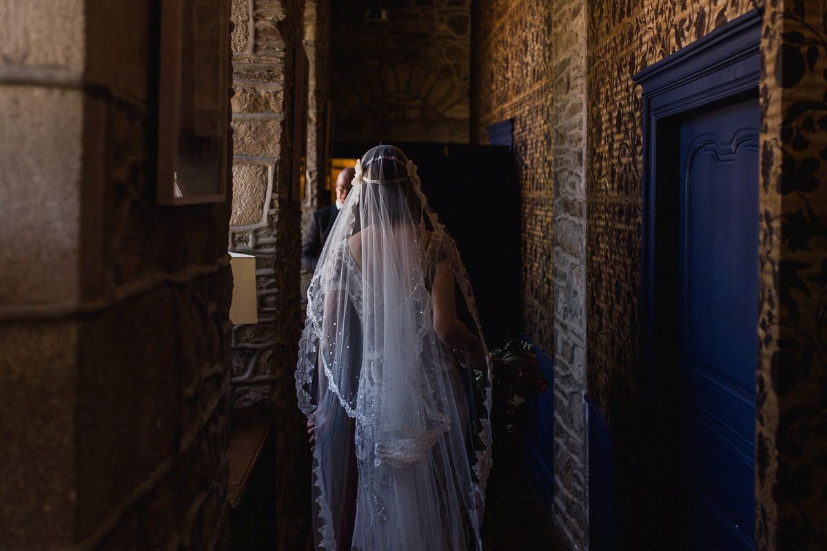 Bride Imogen wore the 'Jayne' gown by Eliza Jane Howell, and a Juliet cap veil, for her Celtic handfasting wedding at a French cheateau. Photography by Lifestories Wedding Photography.