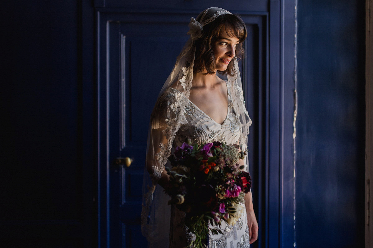 Bride Imogen wore the 'Jayne' gown by Eliza Jane Howell, and a Juliet cap veil, for her Celtic handfasting wedding at a French cheateau. Photography by Lifestories Wedding Photography.