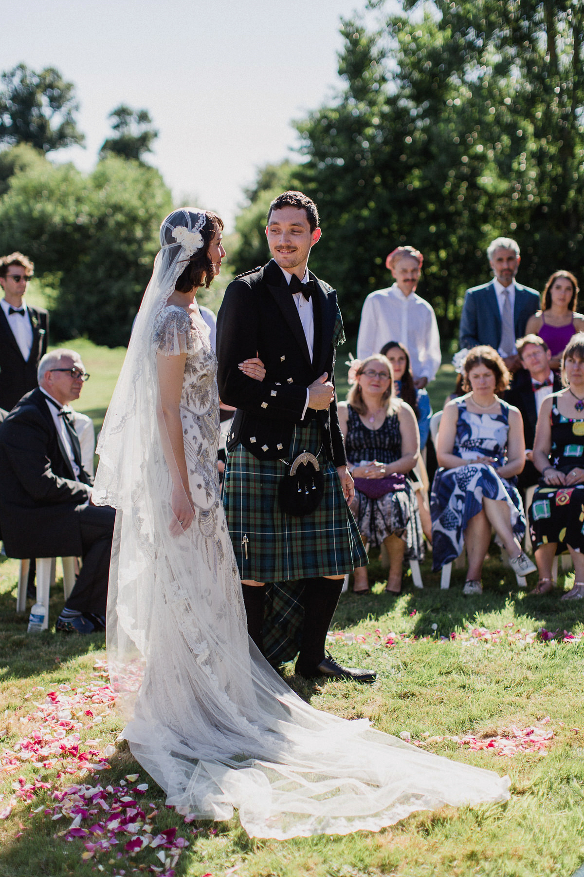 Bride Imogen wore the 'Jayne' gown by Eliza Jane Howell, and a Juliet cap veil, for her Celtic handfasting wedding at a French cheateau. Photography by Lifestories Wedding Photography.