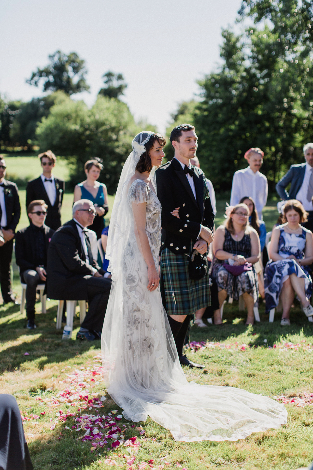 Bride Imogen wore the 'Jayne' gown by Eliza Jane Howell, and a Juliet cap veil, for her Celtic handfasting wedding at a French cheateau. Photography by Lifestories Wedding Photography.