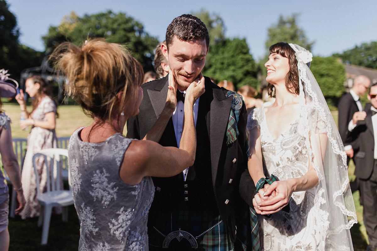 Bride Imogen wore the 'Jayne' gown by Eliza Jane Howell, and a Juliet cap veil, for her Celtic handfasting wedding at a French cheateau. Photography by Lifestories Wedding Photography.