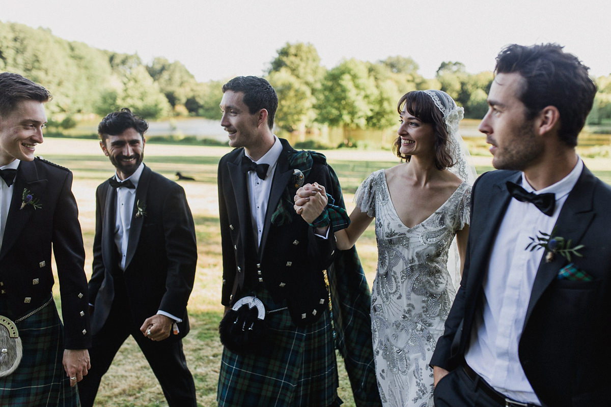 Bride Imogen wore the 'Jayne' gown by Eliza Jane Howell, and a Juliet cap veil, for her Celtic handfasting wedding at a French cheateau. Photography by Lifestories Wedding Photography.