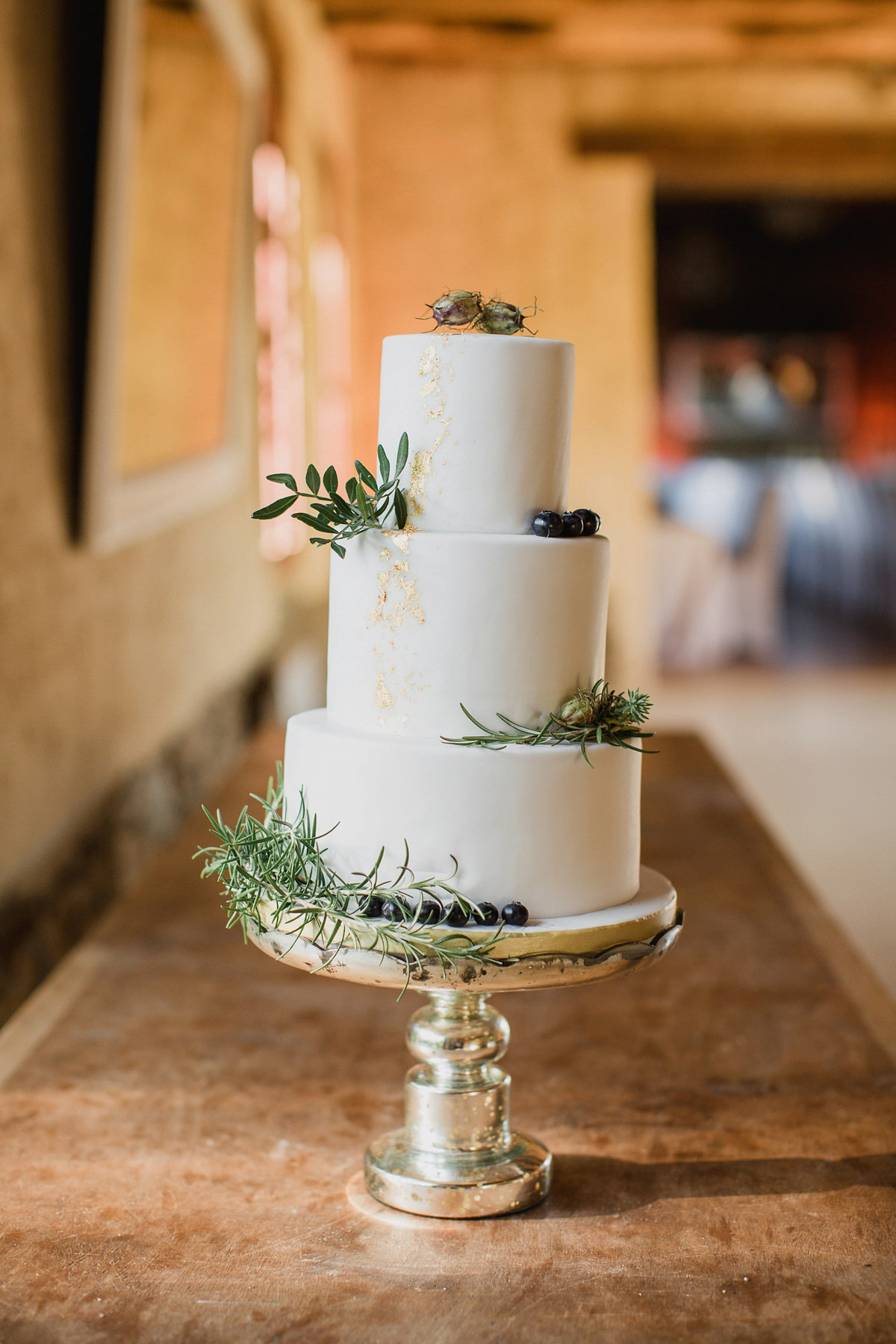 Bride Imogen wore the 'Jayne' gown by Eliza Jane Howell, and a Juliet cap veil, for her Celtic handfasting wedding at a French cheateau. Photography by Lifestories Wedding Photography.