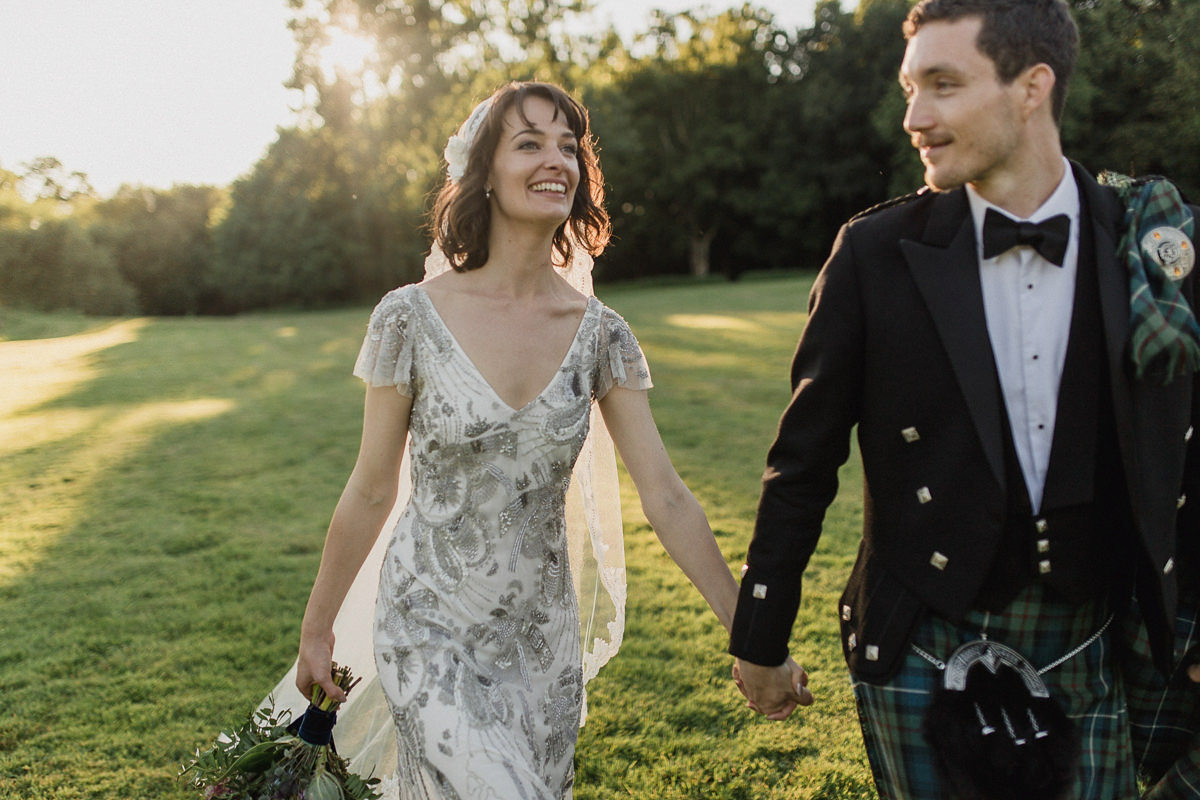 Bride Imogen wore the 'Jayne' gown by Eliza Jane Howell, and a Juliet cap veil, for her Celtic handfasting wedding at a French cheateau. Photography by Lifestories Wedding Photography.