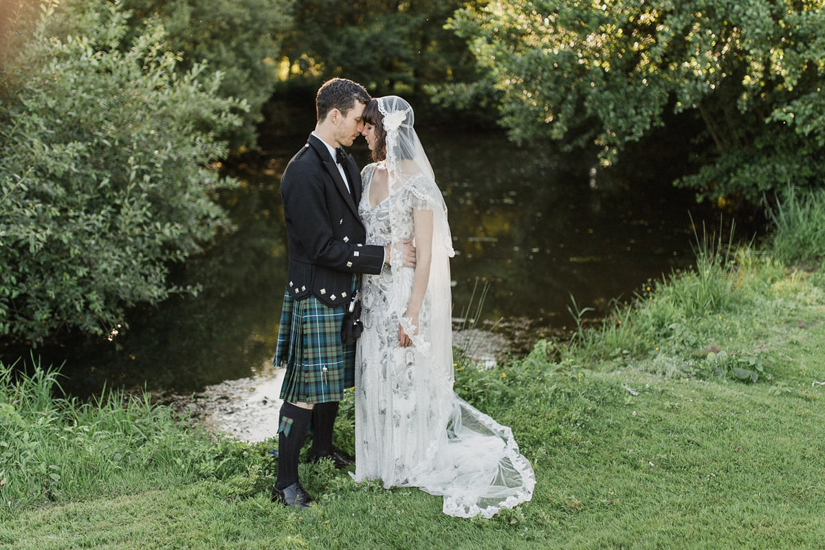 Bride Imogen wore the 'Jayne' gown by Eliza Jane Howell, and a Juliet cap veil, for her Celtic handfasting wedding at a French cheateau. Photography by Lifestories Wedding Photography.