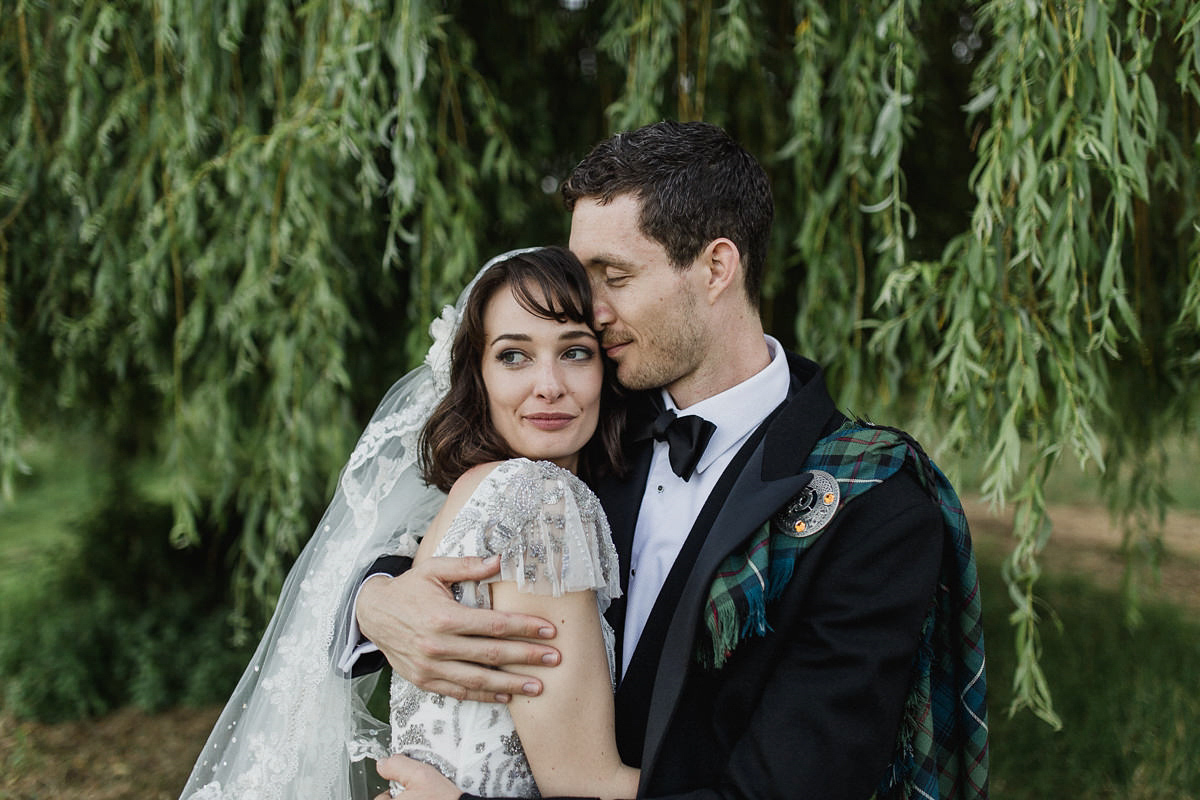 Bride Imogen wore the 'Jayne' gown by Eliza Jane Howell, and a Juliet cap veil, for her Celtic handfasting wedding at a French cheateau. Photography by Lifestories Wedding Photography.