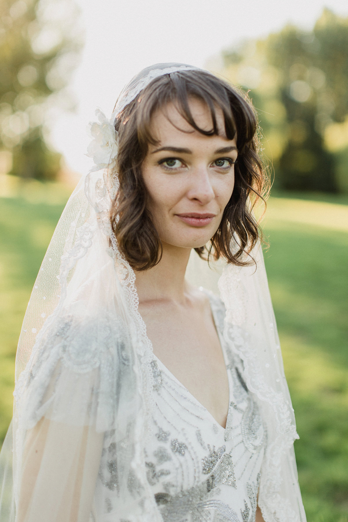 Bride Imogen wore the 'Jayne' gown by Eliza Jane Howell, and a Juliet cap veil, for her Celtic handfasting wedding at a French cheateau. Photography by Lifestories Wedding Photography.