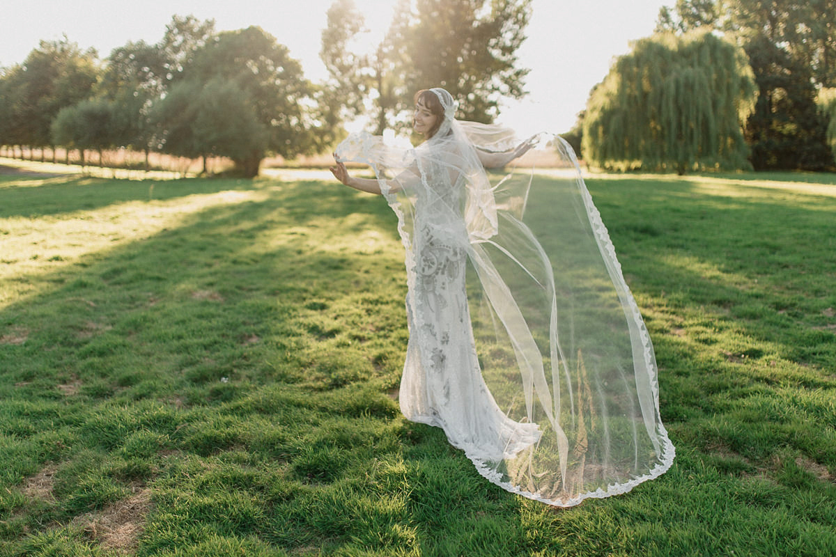 Bride Imogen wore the 'Jayne' gown by Eliza Jane Howell, and a Juliet cap veil, for her Celtic handfasting wedding at a French cheateau. Photography by Lifestories Wedding Photography.