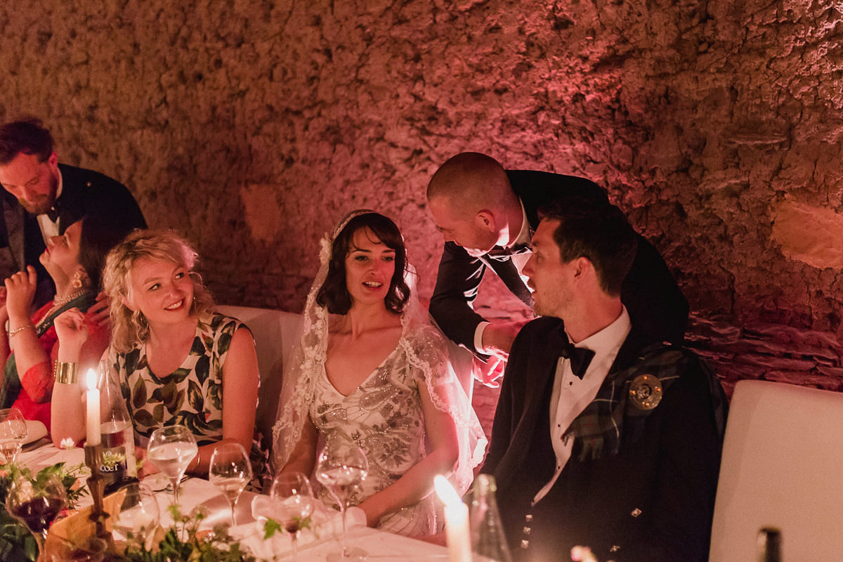 Bride Imogen wore the 'Jayne' gown by Eliza Jane Howell, and a Juliet cap veil, for her Celtic handfasting wedding at a French cheateau. Photography by Lifestories Wedding Photography.