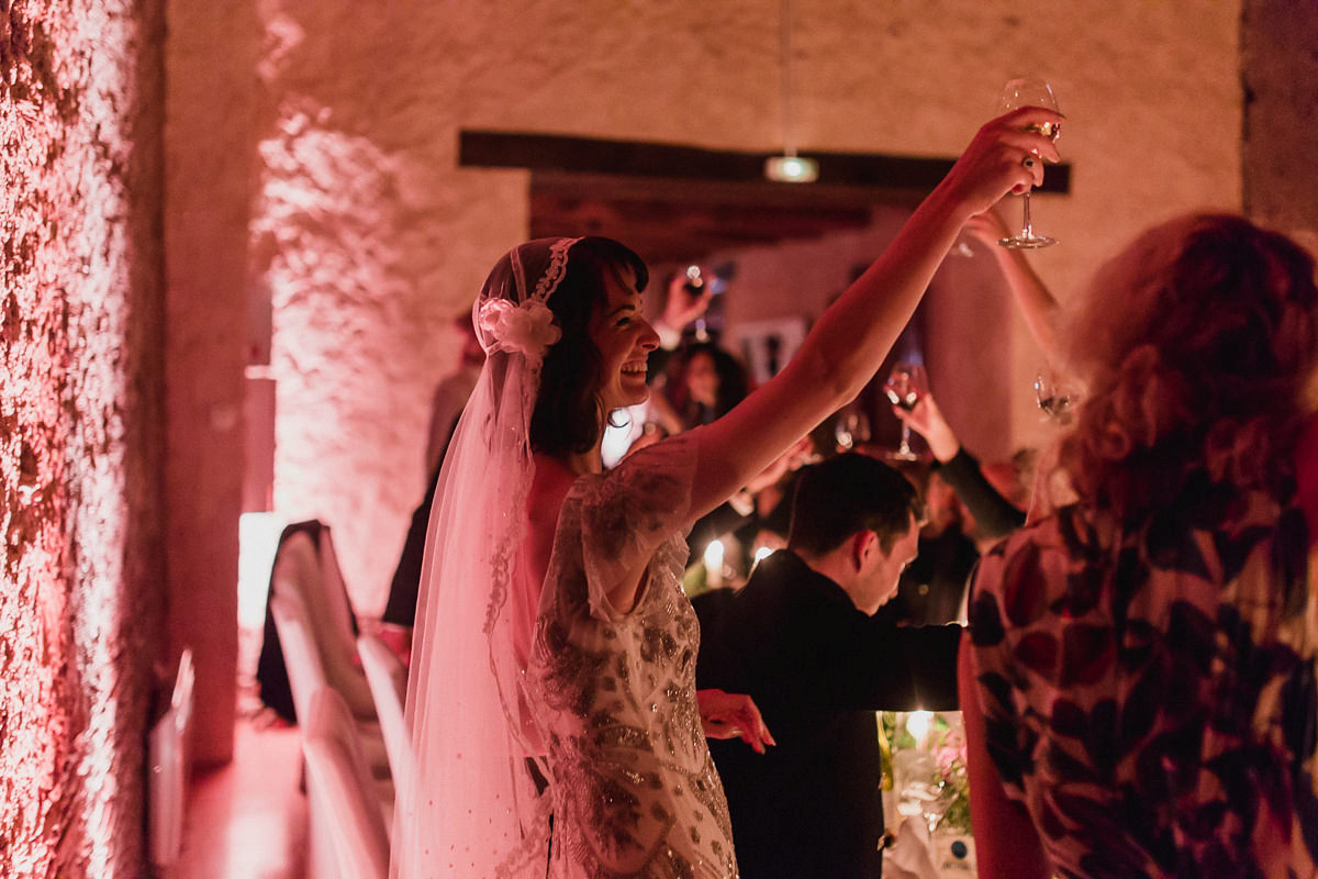 Bride Imogen wore the 'Jayne' gown by Eliza Jane Howell, and a Juliet cap veil, for her Celtic handfasting wedding at a French cheateau. Photography by Lifestories Wedding Photography.