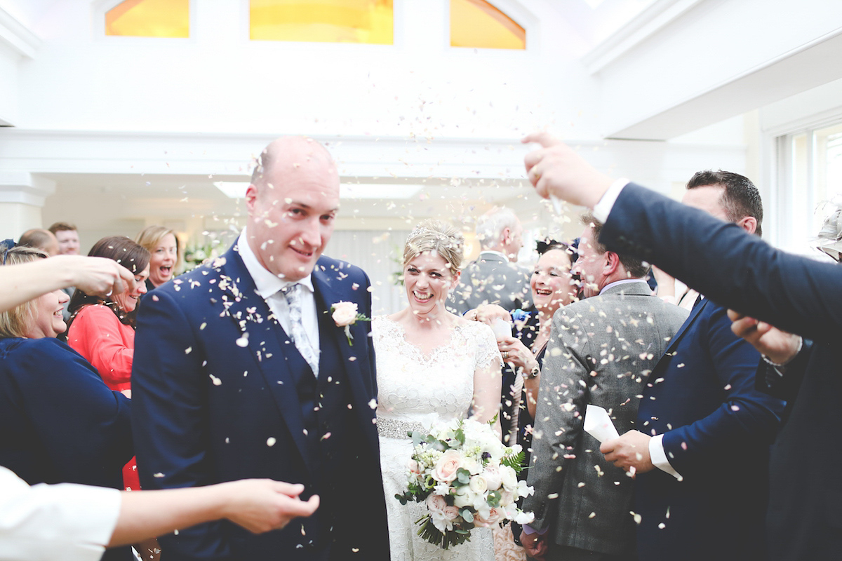 Kate wore a 1950's inspired gown by Fur Coat No Knickers for her elegant and romantic Spring wedding at Pembroke Lodge. Images by Funky Photography.