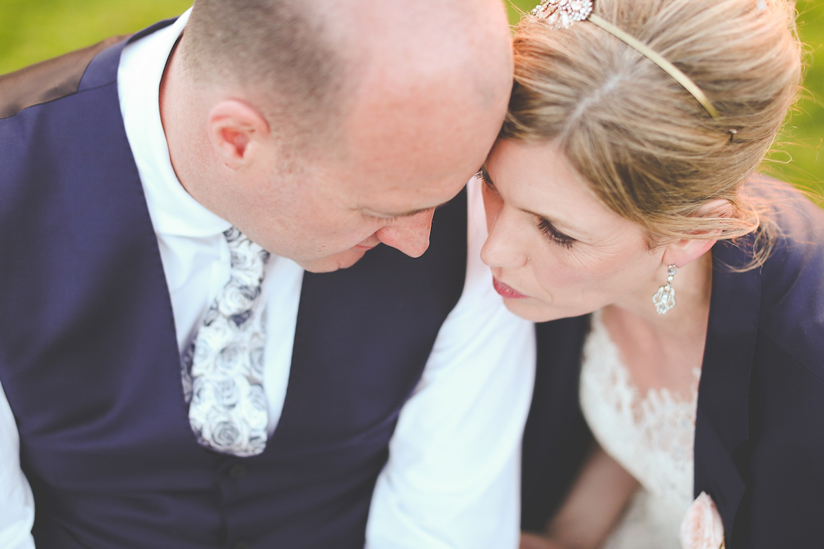 Kate wore a 1950's inspired gown by Fur Coat No Knickers for her elegant and romantic Spring wedding at Pembroke Lodge. Images by Funky Photography.