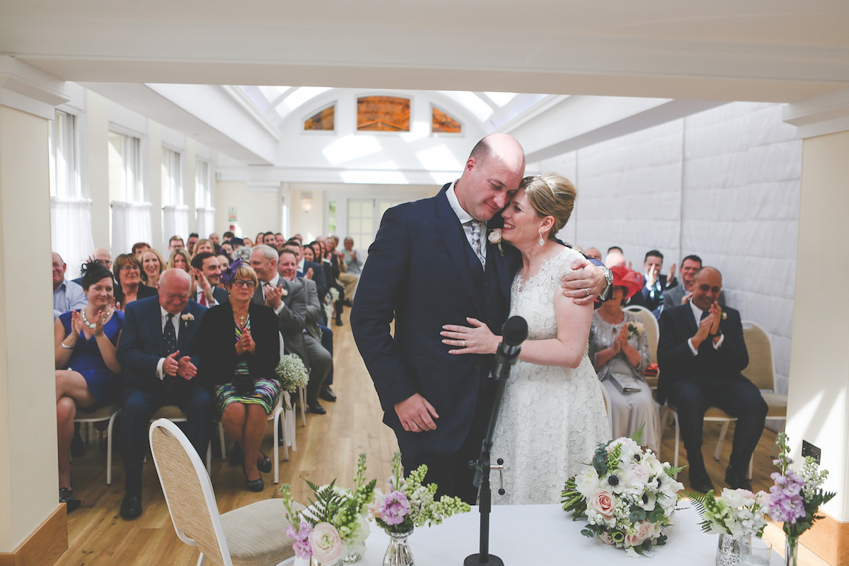 Kate wore a 1950's inspired gown by Fur Coat No Knickers for her elegant and romantic Spring wedding at Pembroke Lodge. Images by Funky Photography.