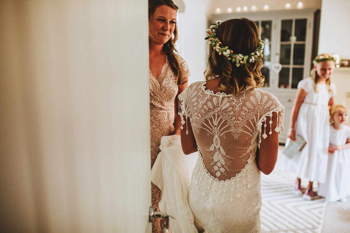 Jessica wore a Claire Pettibone gown from Ellie Sanderson in Surrey for her country village wedding that was full of fun and charm. Photography by Frankee Victoria.