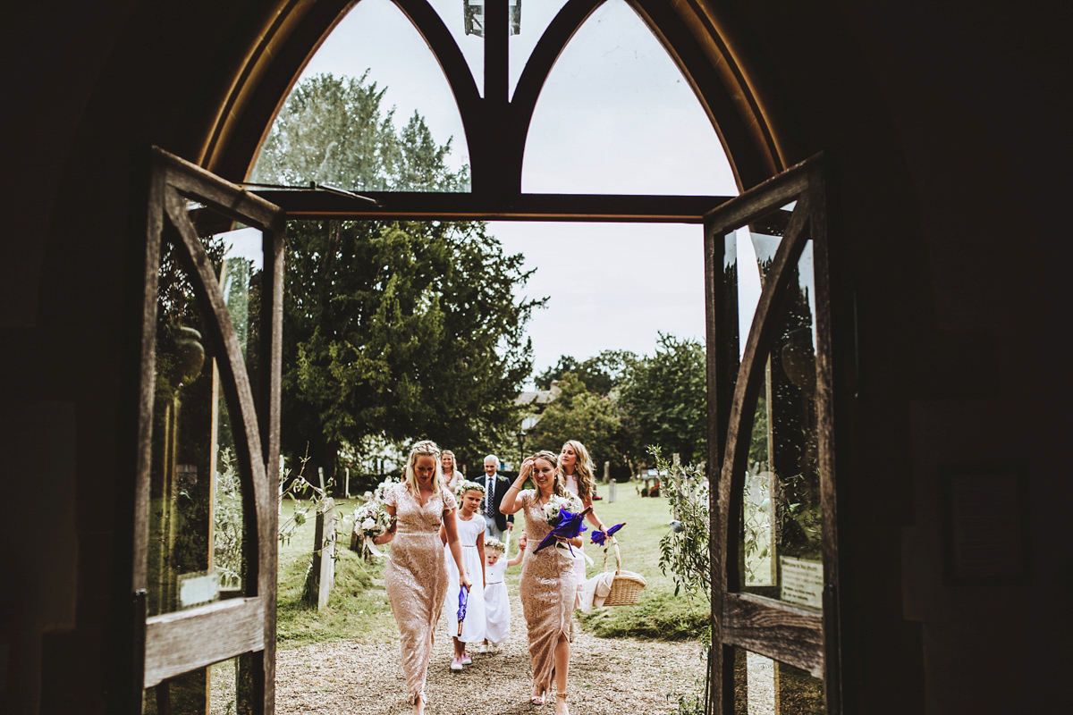 Jessica wore a Claire Pettibone gown from Ellie Sanderson in Surrey for her country village wedding that was full of fun and charm. Photography by Frankee Victoria.