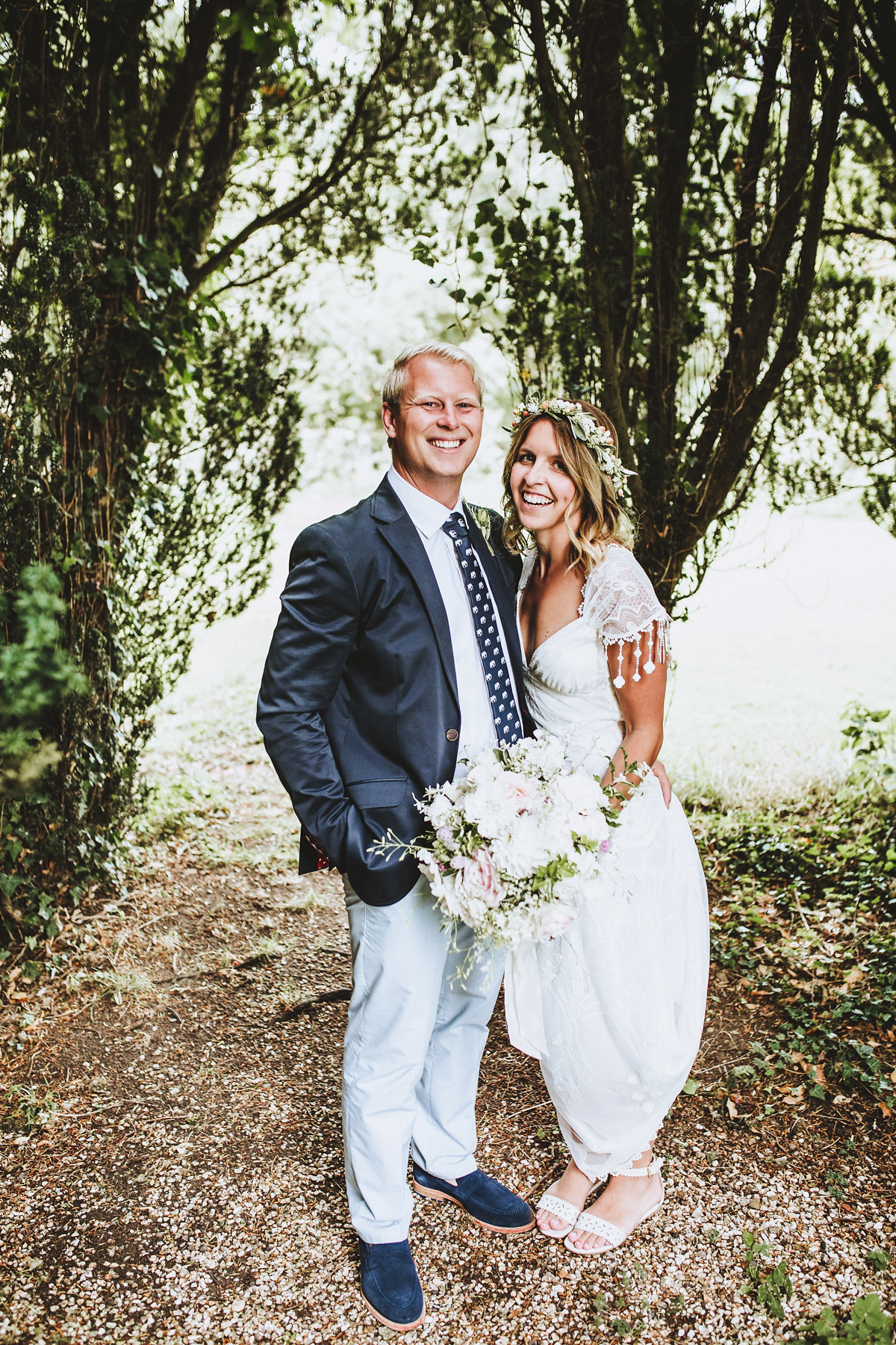 Jessica wore a Claire Pettibone gown from Ellie Sanderson in Surrey for her country village wedding that was full of fun and charm. Photography by Frankee Victoria.