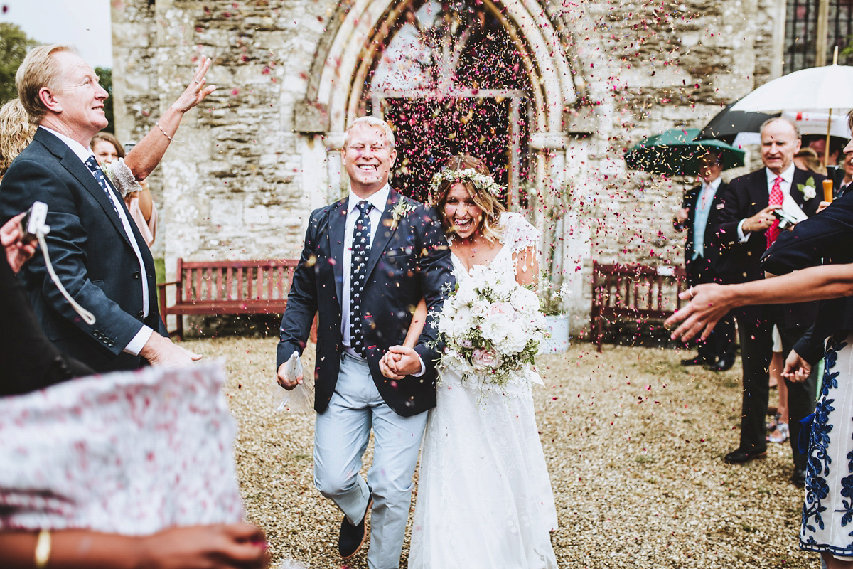 Jessica wore a Claire Pettibone gown from Ellie Sanderson in Surrey for her country village wedding that was full of fun and charm. Photography by Frankee Victoria.