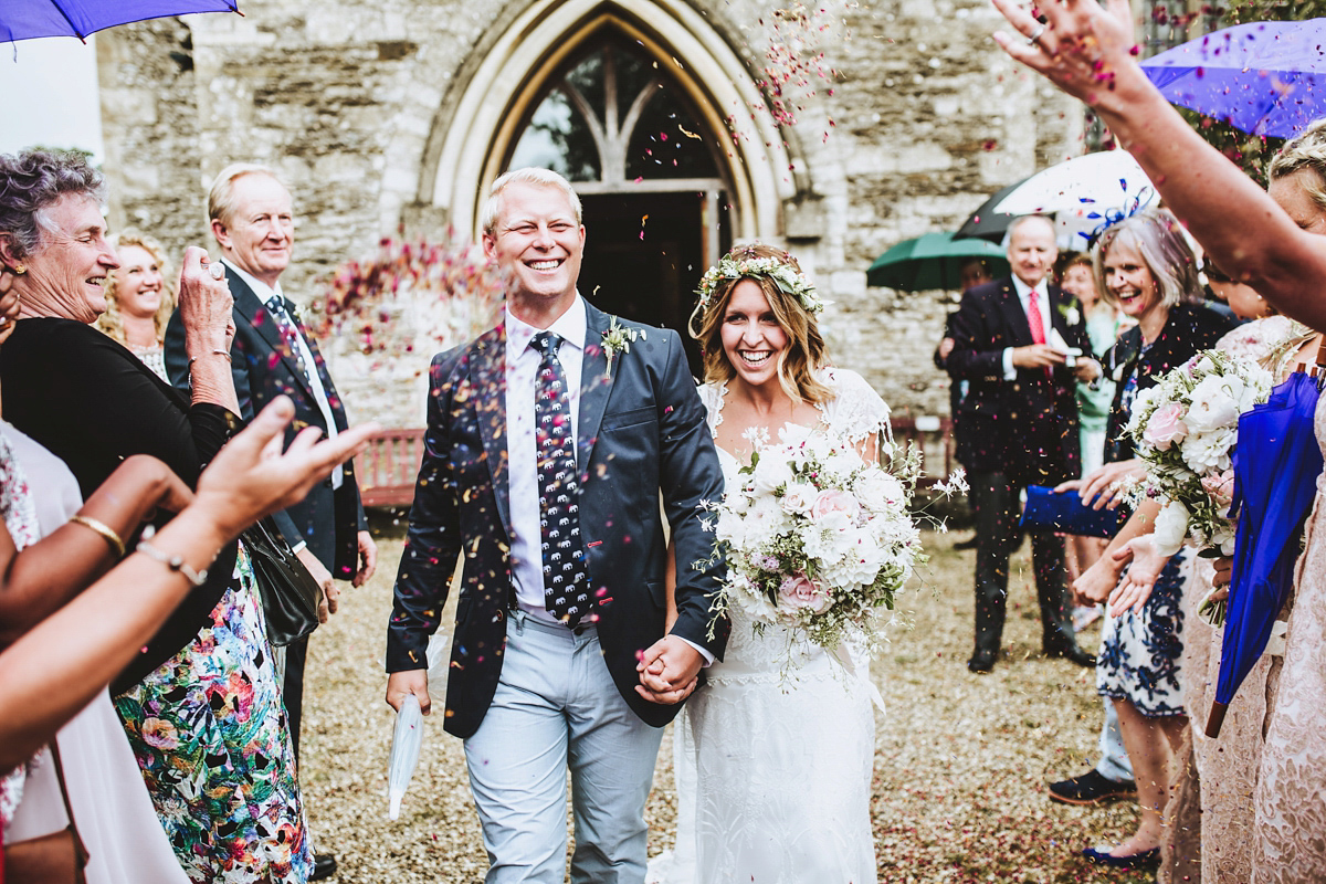 Jessica wore a Claire Pettibone gown from Ellie Sanderson in Surrey for her country village wedding that was full of fun and charm. Photography by Frankee Victoria.