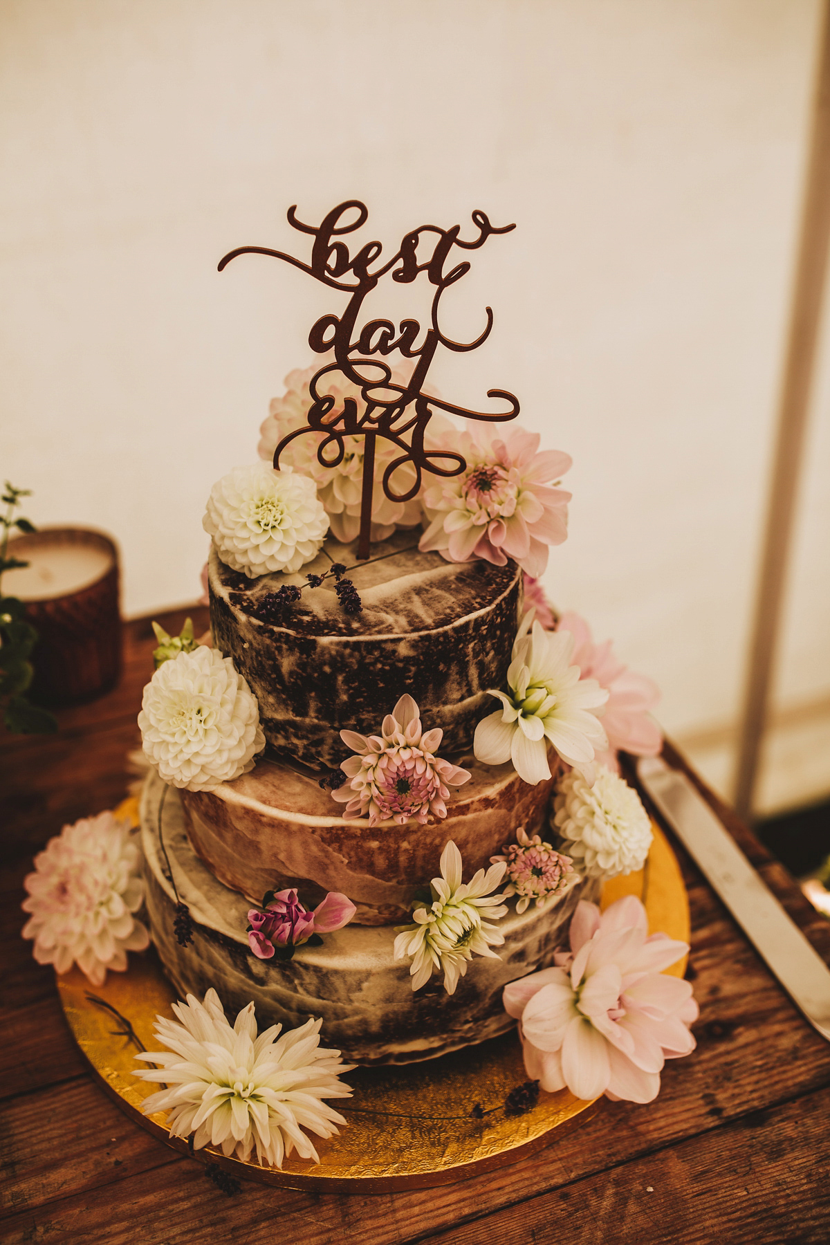 Jessica wore a Claire Pettibone gown from Ellie Sanderson in Surrey for her country village wedding that was full of fun and charm. Photography by Frankee Victoria.