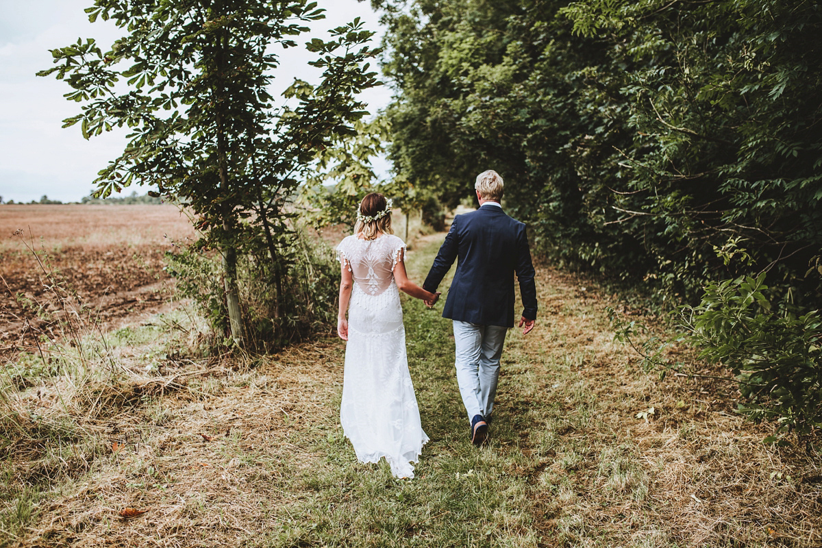 Jessica wore a Claire Pettibone gown from Ellie Sanderson in Surrey for her country village wedding that was full of fun and charm. Photography by Frankee Victoria.