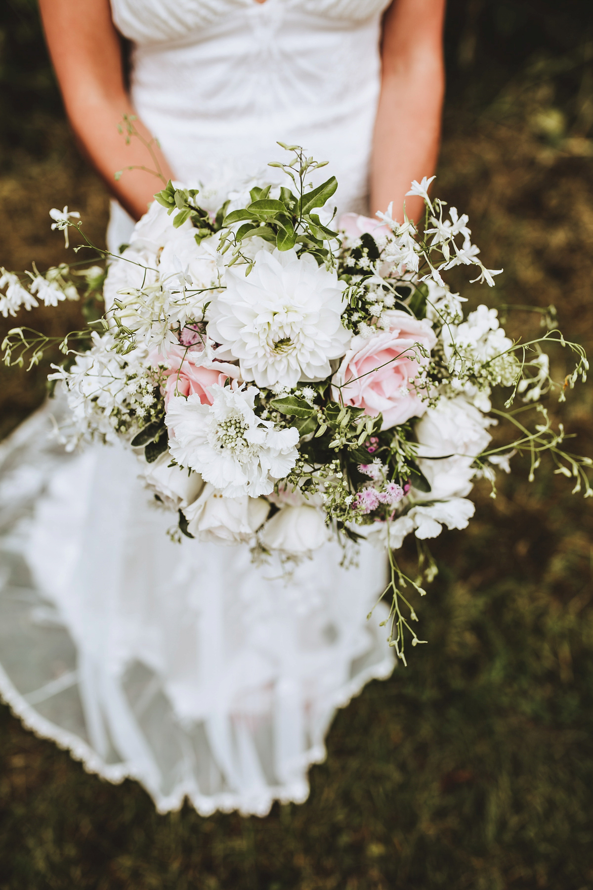 Jessica wore a Claire Pettibone gown from Ellie Sanderson in Surrey for her country village wedding that was full of fun and charm. Photography by Frankee Victoria.