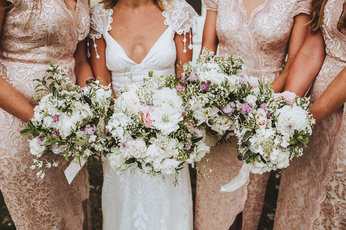 Jessica wore a Claire Pettibone gown from Ellie Sanderson in Surrey for her country village wedding that was full of fun and charm. Photography by Frankee Victoria.