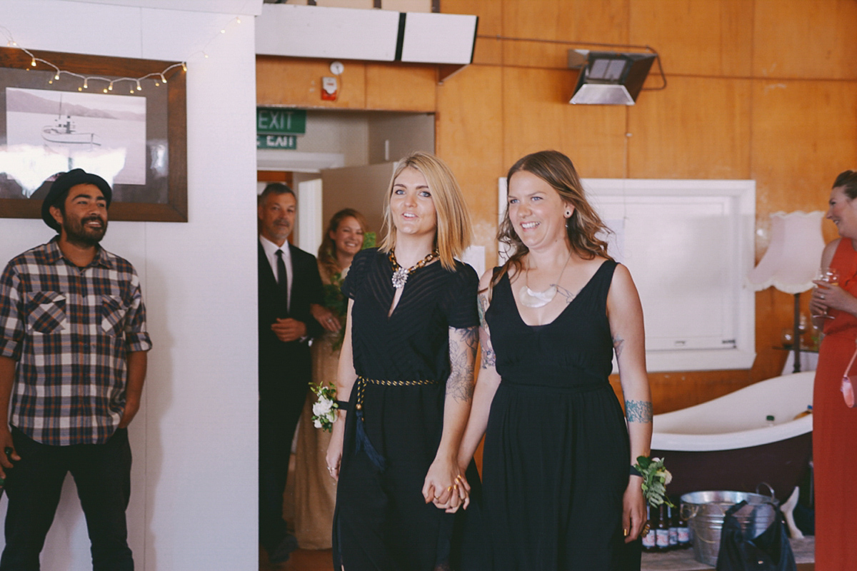 Amelia wore a gold sequin wedding dress for her relaxed, homespun and handmade wedding by the seaside in New Zealand. Photography by Sarah Burton.