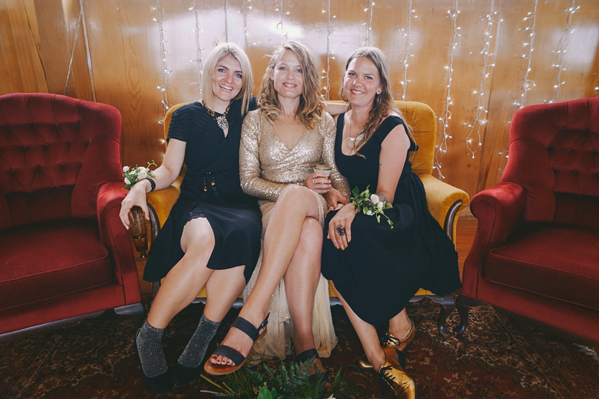 Amelia wore a gold sequin wedding dress for her relaxed, homespun and handmade wedding by the seaside in New Zealand. Photography by Sarah Burton.